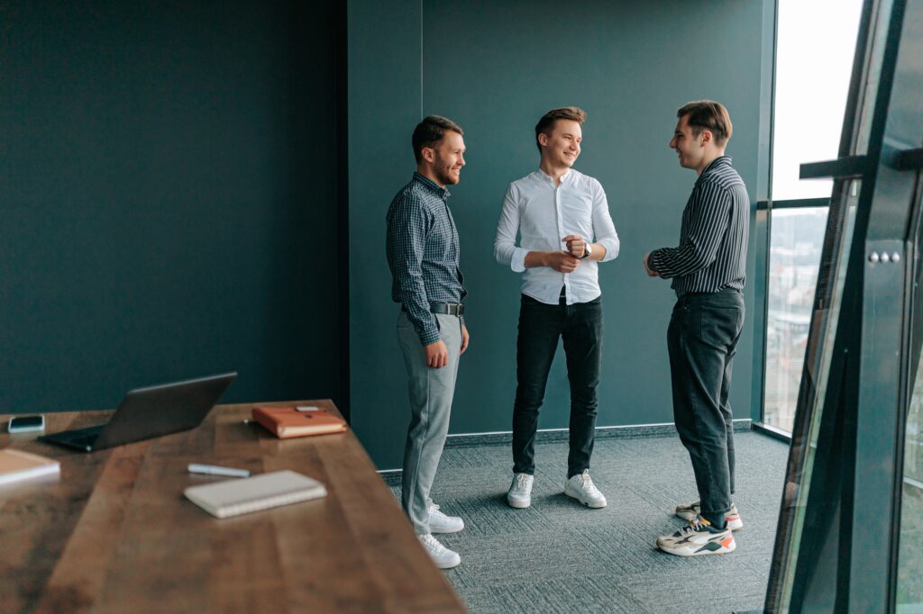 Office workers having a meeting and discussing the progress of their work.